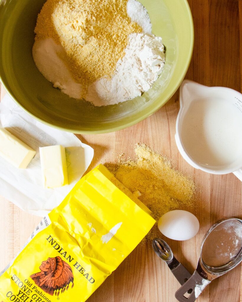 Ingredients for cornbred - egg, butter, cornmeal.