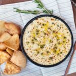 Baked ricotta with pita chips on the side.