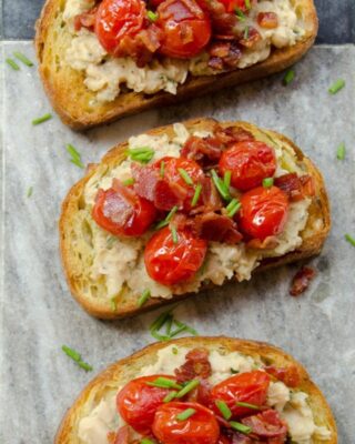 White Bean Toasts with Burst Grape Tomatoes and Pancetta