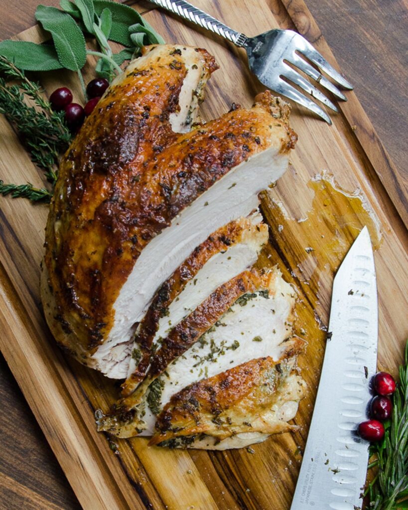 Air Fried Thanksgiving Turkey breast on a cutting board.