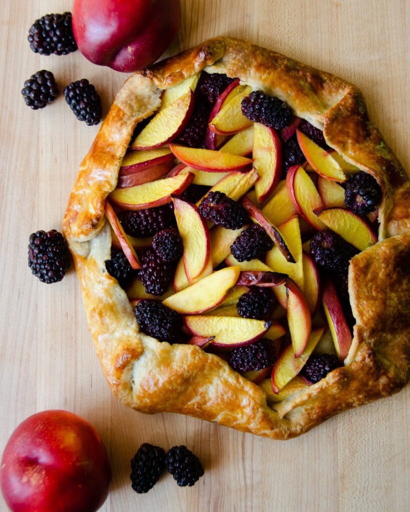 Easy Fruit Tart on a wooden board.