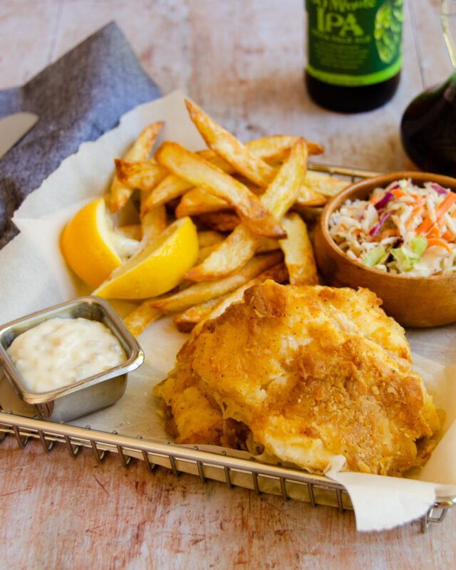 Traditional Homemade British Beer Battered Fish and Chips, with a classic  easy batter recipe