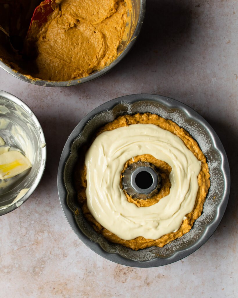 Cream cheese filling in a cavity in the middle of a bundt cake.