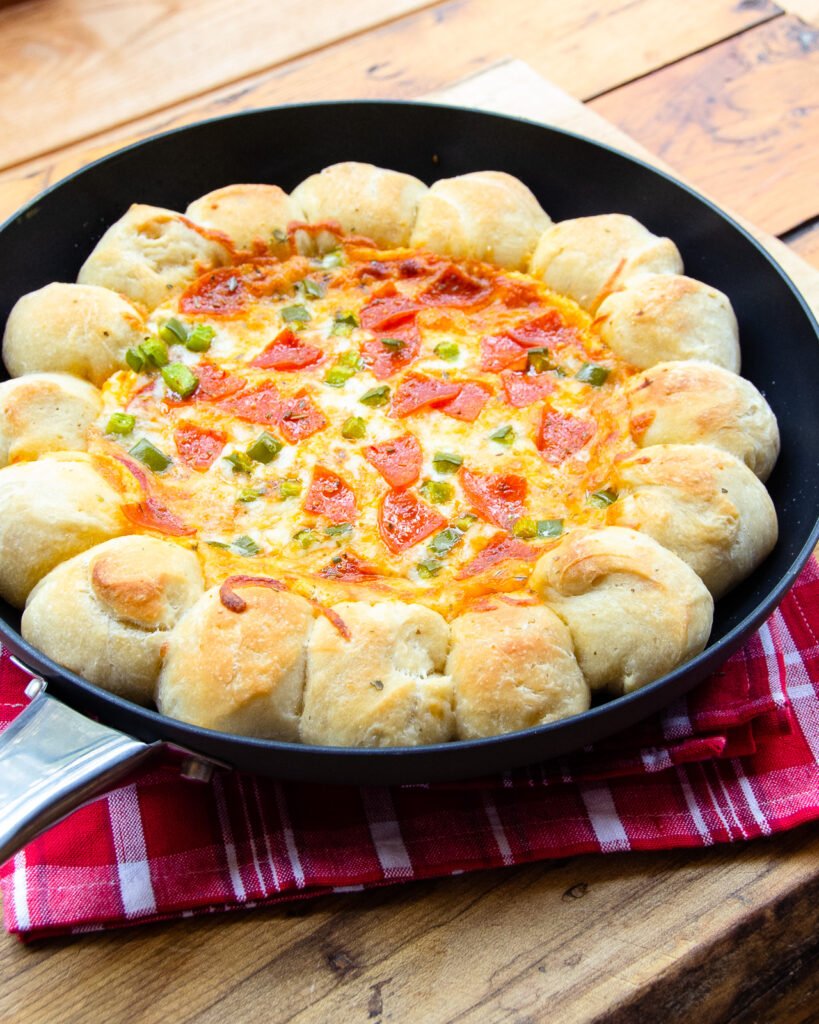 https://bluejeanchef.com/uploads/2020/01/Skillet-Pizza-Bread-1280-750-819x1024.jpg