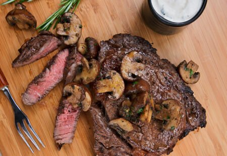 Marinated Rib Eye Steak with Herb Roasted Mushrooms