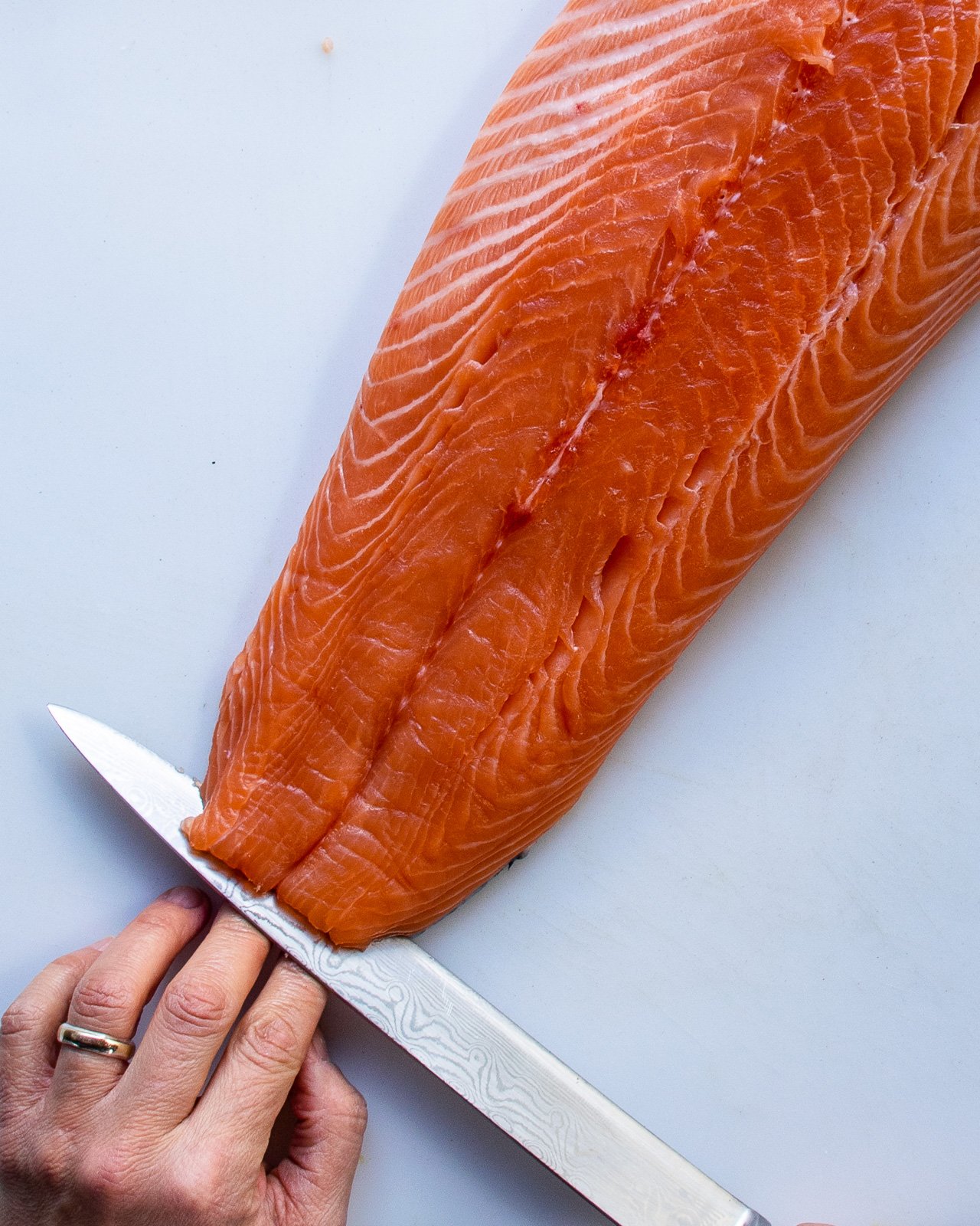 Cutting A Side Of Salmon