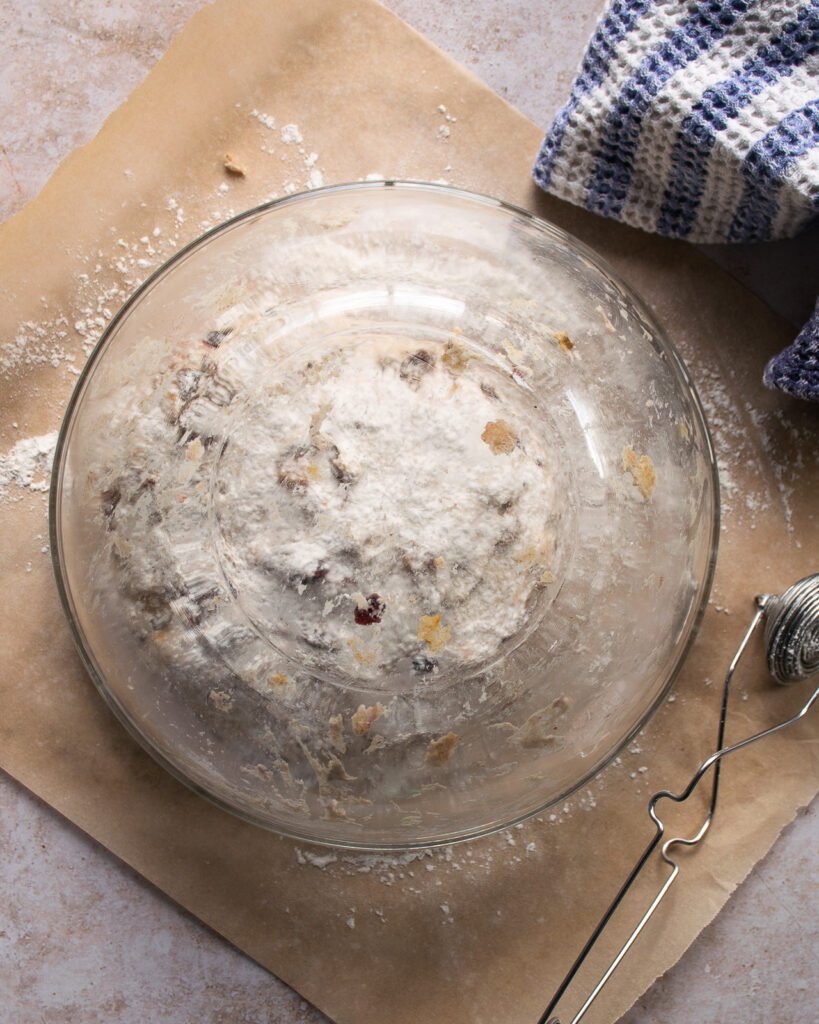 Bread dough covered with a bowl.