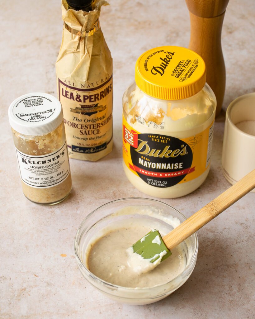 Ingredients on a counter with a bowl and spatula.