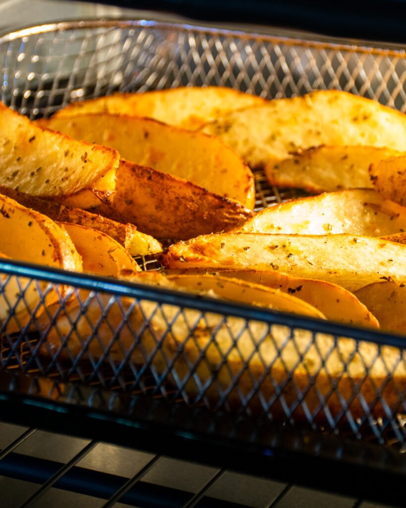 https://bluejeanchef.com/uploads/2021/03/Greek-Potato-Wedges-1280-3329-819x1024.jpg