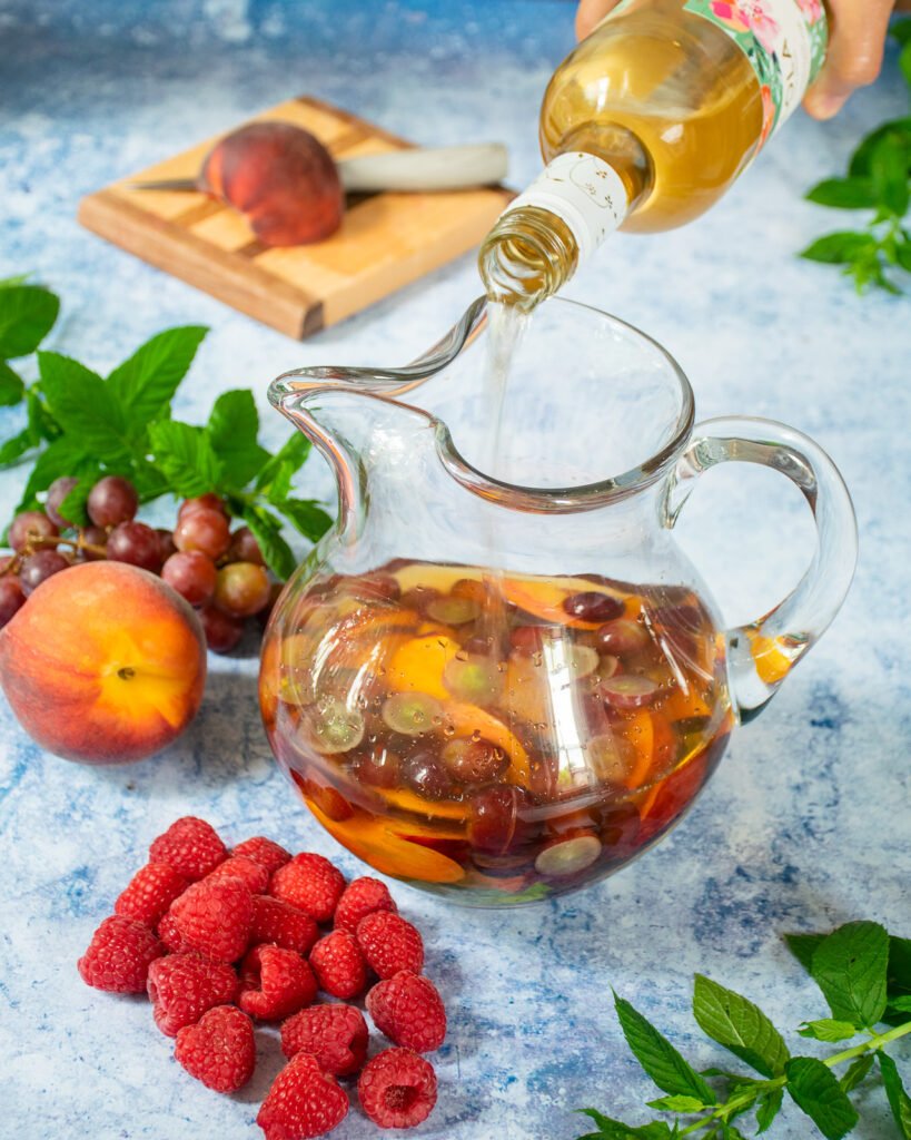 A Colorful Sangria , Showcasing a Large Pitcher Filled with Red or White  Wine, Fresh Fruit, and a Splash of Brandy, Accompanied by Stock  Illustration - Illustration of alcohol, orange: 274708566