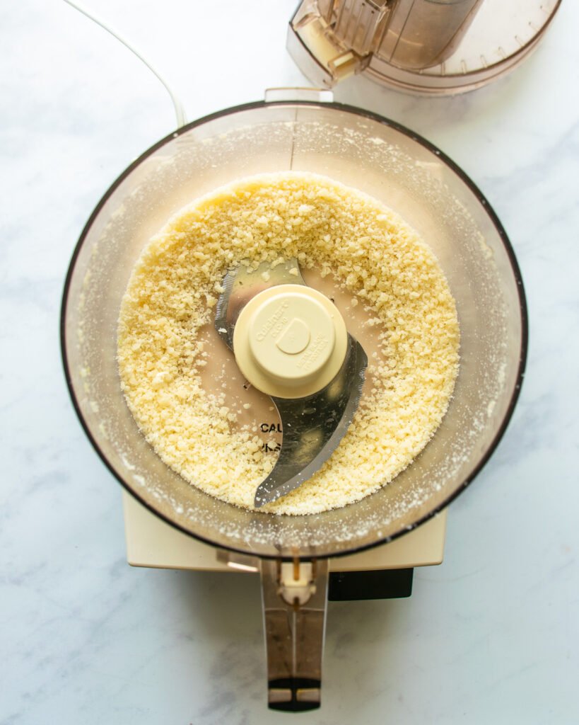 Parmesan cheese in a food processor.