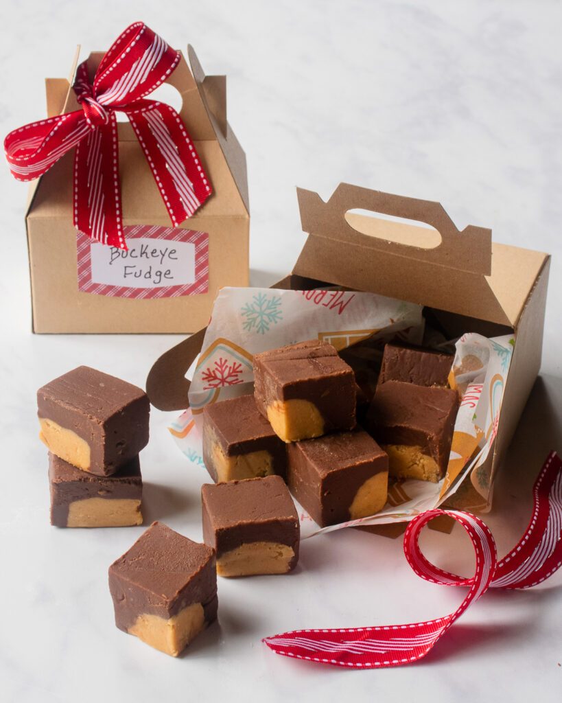 Buckeye Fudge in gift boxes with red ribbon.
