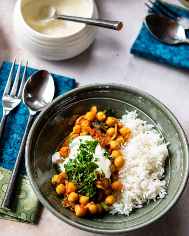 Tomato Braised Chickpeas with Spinach and Lemon-Cumin Drizzle