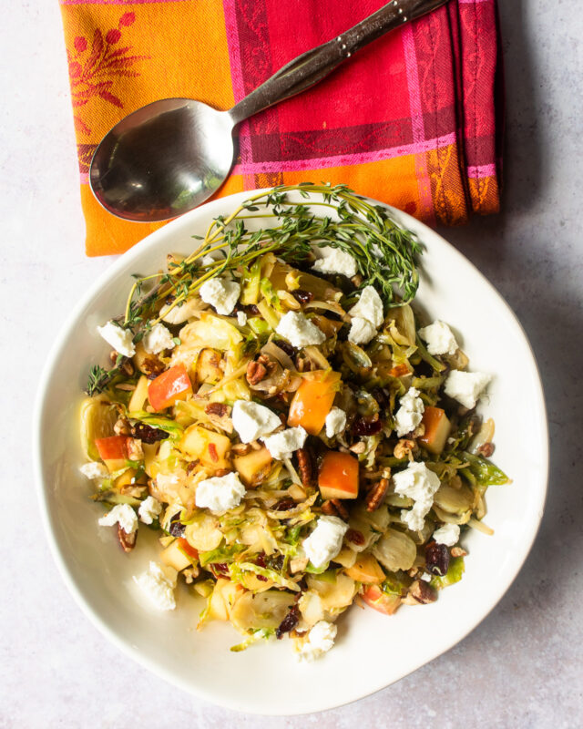 Shaved Brussels Sprouts with Apples, Pecans and Dried Cranberries
